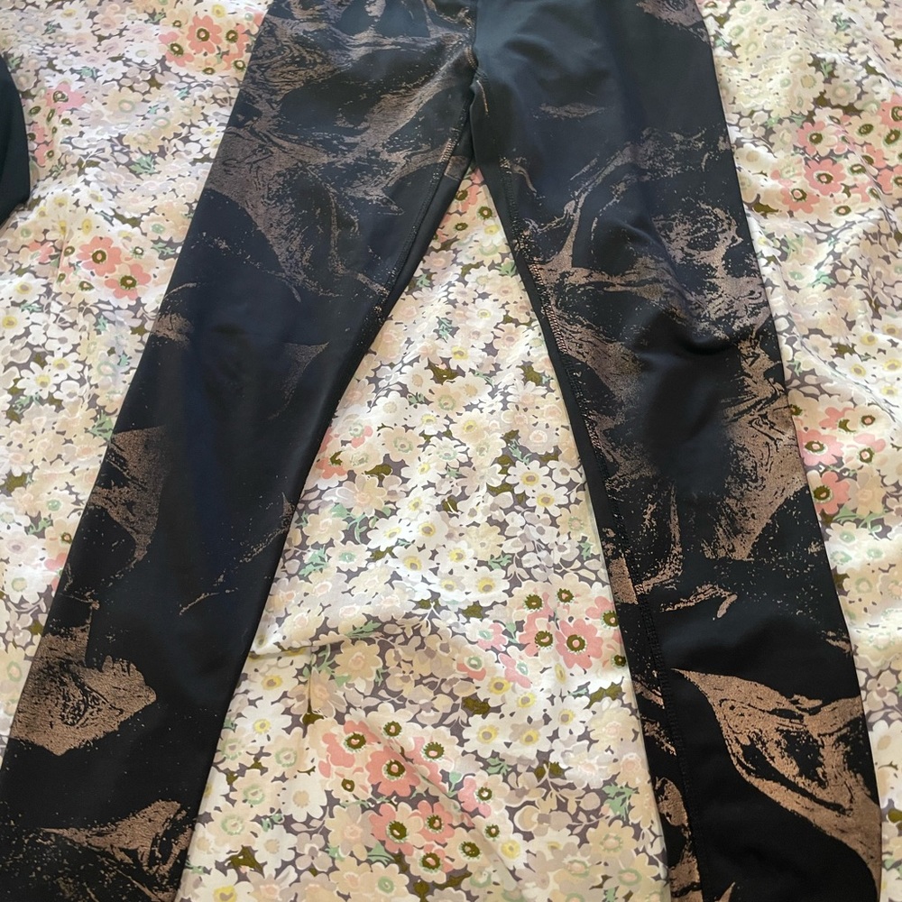 A bundle of 4 pairs of size 10,12,8 girls leggings